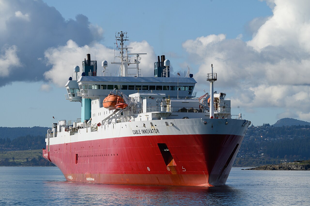 Bow view of the cable-laying vessel CS Cable Innovator arriving at a port terminal